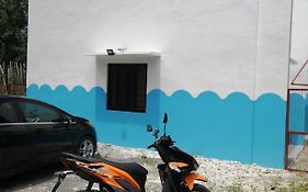 Bluewaves Apartment, Scooter, Car